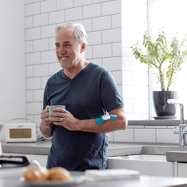 Paingone Easy being used by a man on his forearm