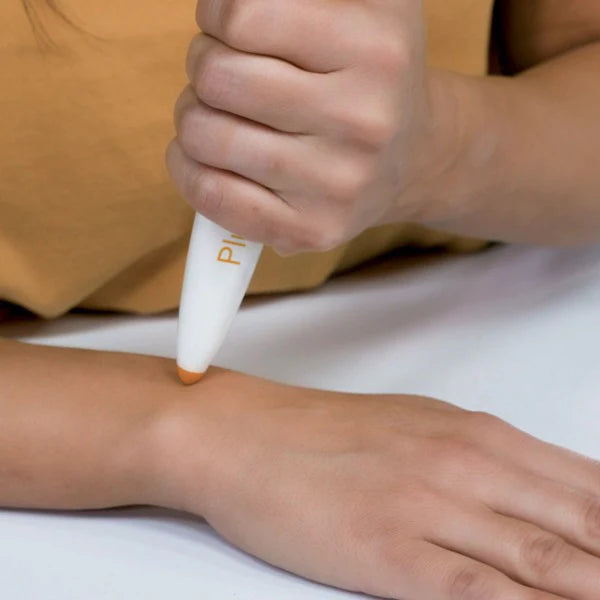 Paingone Plus being used on a wrist