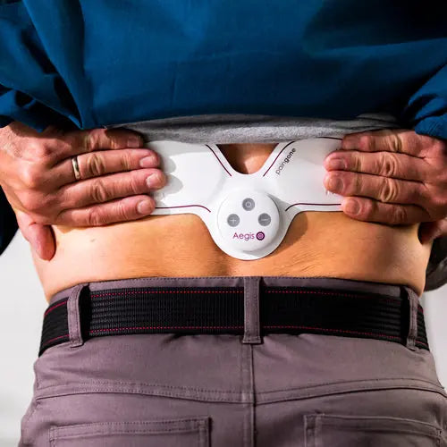 Man wearing PainGone Aegis on his lower back