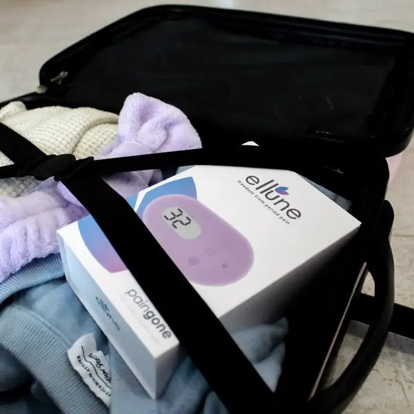 PainGone Ellune packed in a bag for on-the-go period relief